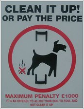 picture of warning sign about picking up dog-droppings