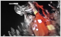 picture of Gerrard holding up cup
